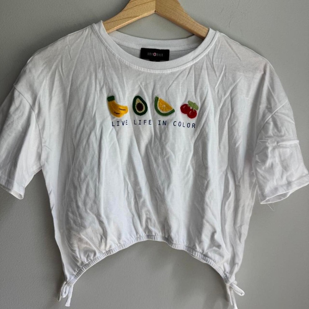 Girls White crop top with embroidered fruit graphic and 'LIVE LIFE IN COLOR